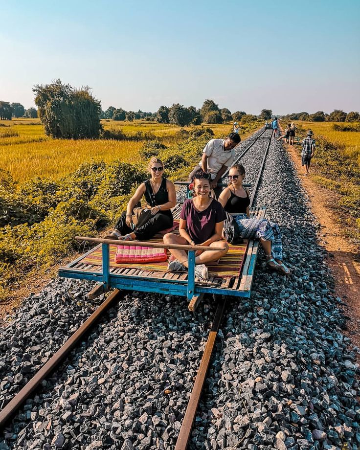 Best Things to Do in Battambang, Cambodia: Your Essential Guide to Authentic Experiences 1 People riding on Bamboo train